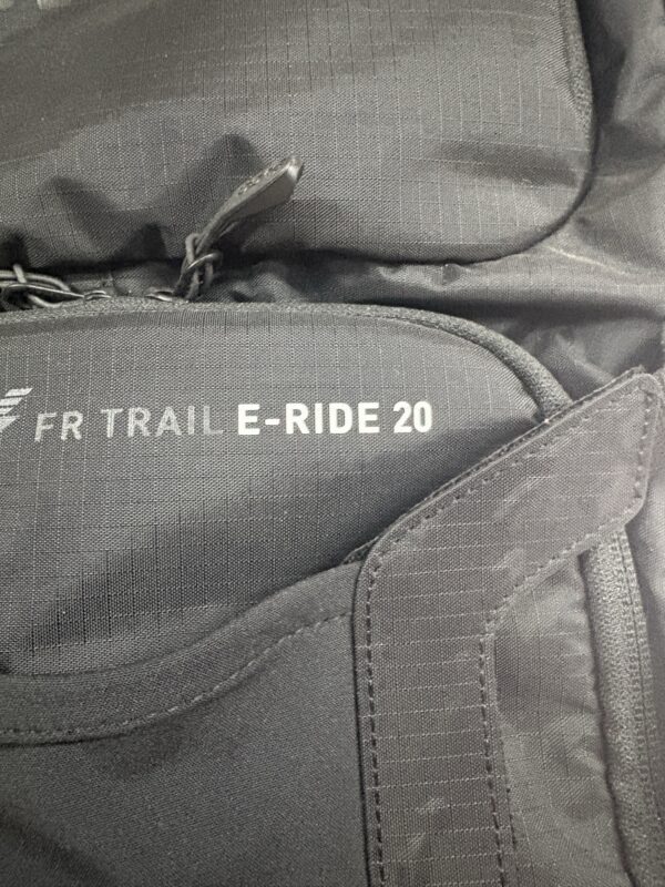 EVOC FR Trail E-Ride 20 logo on the front pocket