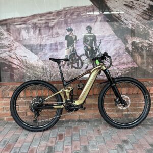 Pre-owned Giant Trance X E+ 2 e-MTB in gold, side view