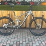 Pre-owned Trek Fuel EX 8 XT Gen 6 XL in Satin Mercury, side view
